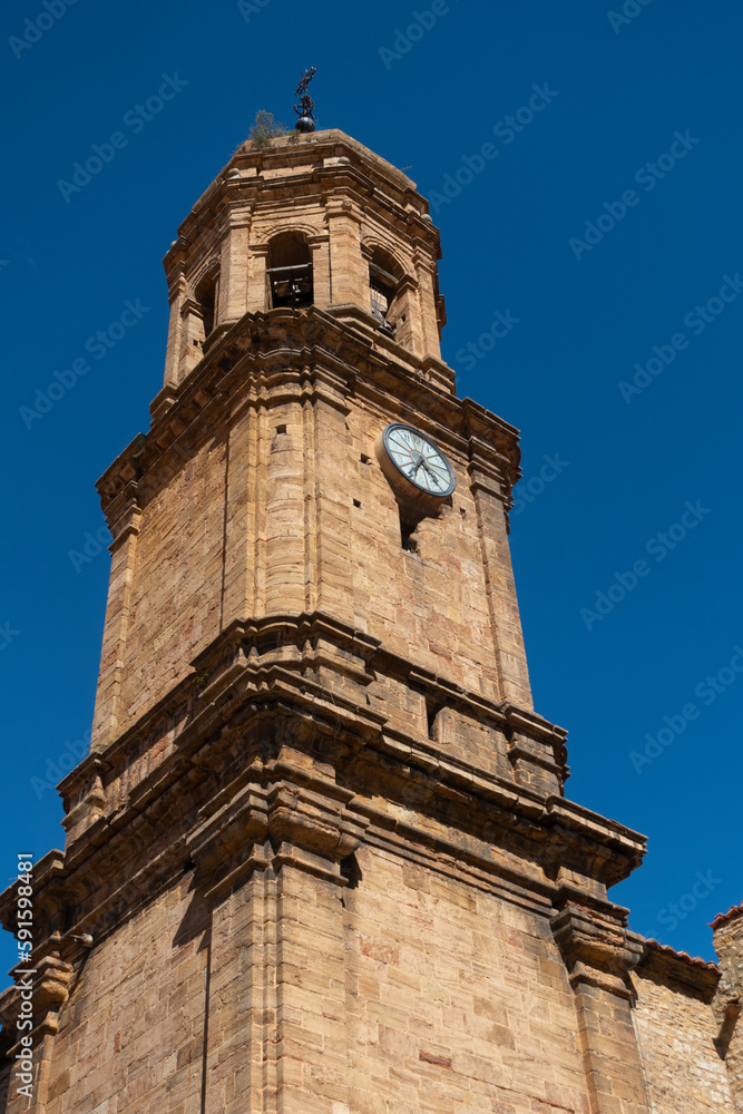 Iglesia de la Purificación - Iglesuela del Cid - Torre campanario sobre cielo azul