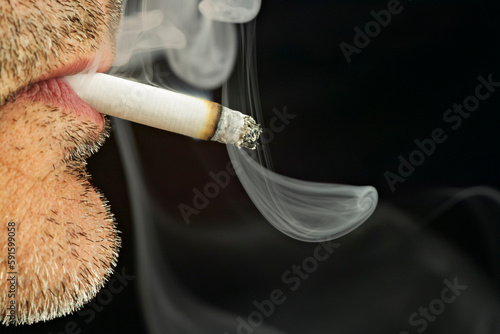 Close Up of Man Smoking Cigarette photo