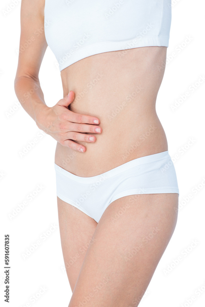 Fototapeta premium Woman touching her belly 
