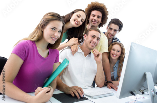 Smiling students in computer class © vectorfusionart