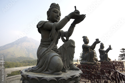 Statue in Po Lin Monastery, Ngong Ping, Lantau Island, Hong Kong, China photo