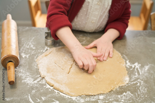 Little Girl Baking Christmas Cookies photo