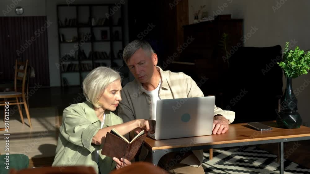Caucasian couple in love making remote working during home time in apartment using laptop computer for browsing web publication, skilled colleagues planning together vacation and making booking
Caucasian couple in love making remote working during home time in apartment using laptop computer for browsing web publication, skilled colleagues planning together vacation and making booking