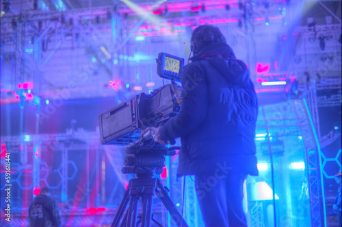 cameraman filming a concert for tv