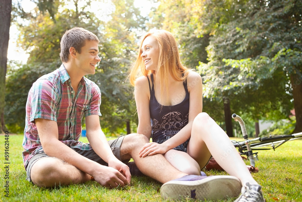 Young Couple in Park on a Summer Day, Portland, Oregon, USA Young Couple in Park on a Summer Day, Portland, Oregon, USA