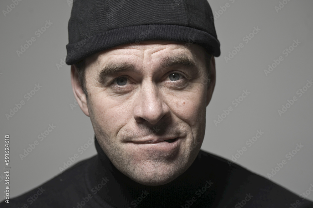 Portrait of Man in Black Cap Portrait of Man in Black Cap