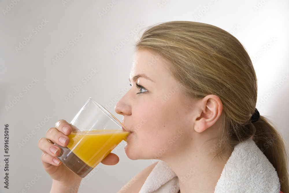 Close-up of Woman Drinking Orange Juice Close-up of Woman Drinking Orange Juice