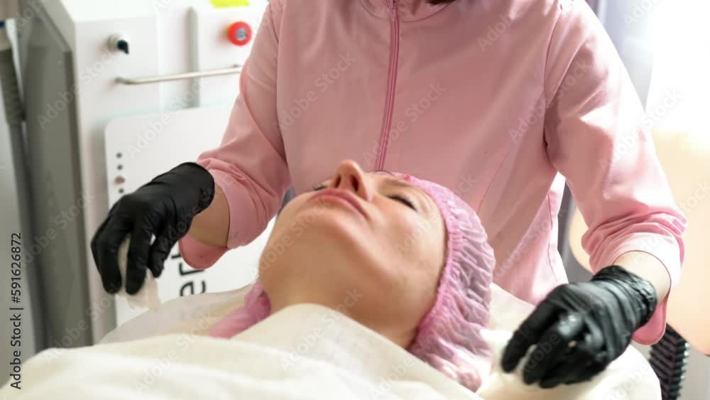 Female beautician using makeup equipment and organic mask for cleansing and moisturize skin, Caucasian client enjoying day spa recreation in spa salon for wellbeing Female beautician using makeup equipment and organic mask for cleansing and moisturize skin, Caucasian client enjoying day spa recreation in spa salon for wellbeing