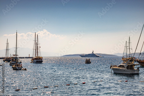 Boats standing on the coast of Bodrum, Mugla in summer day.
