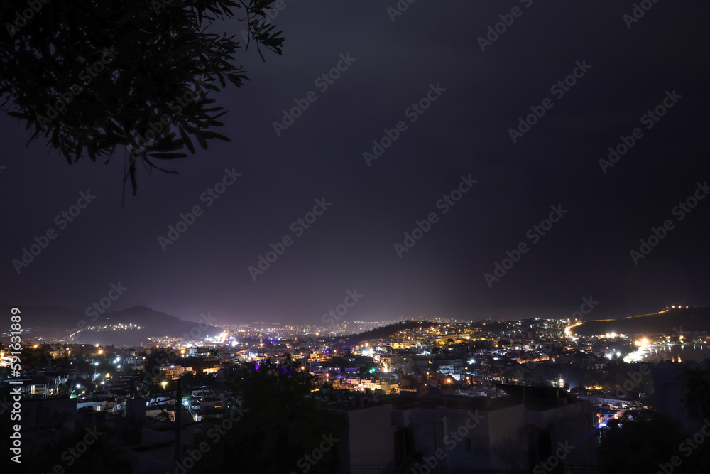 Obraz premium Dark cityscape and lights after rain at evening.