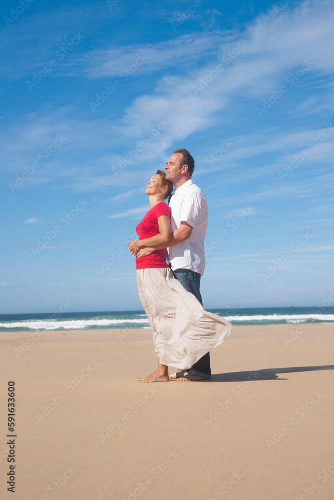 Mature Couple Hugging on the Beach, Camaret-sur-Mer, Crozon Peninsula, Finistere, Brittany, France Mature Couple Hugging on the Beach, Camaret-sur-Mer, Crozon Peninsula, Finistere, Brittany, France