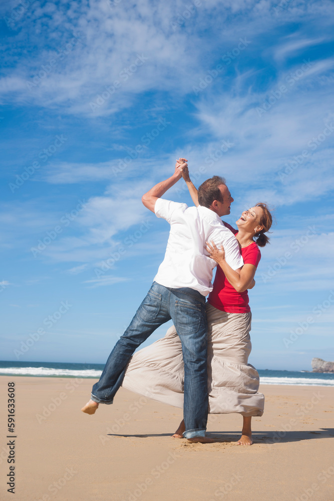 Couple Dancing on the Beach, Camaret-sur-Mer, Crozon Peninsula, Finistere, Brittany, France Couple Dancing on the Beach, Camaret-sur-Mer, Crozon Peninsula, Finistere, Brittany, France