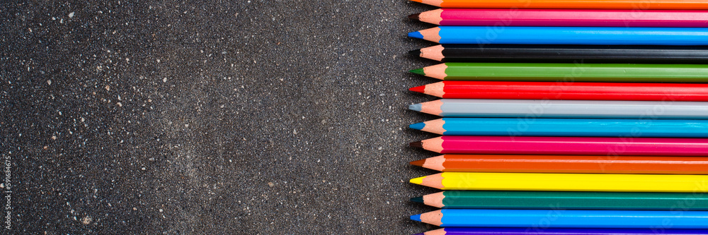 Colorful pencils on dark table Colorful pencils on dark table