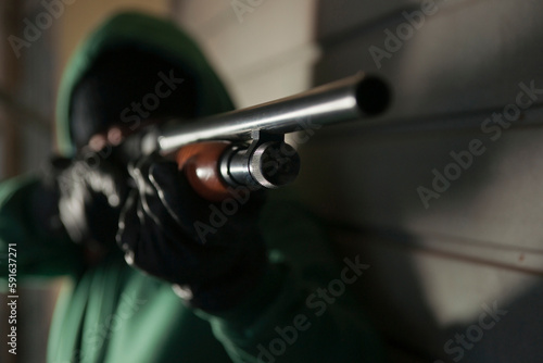 Man Aiming Shotgun, Mannheim, Baden-Wurttemberg, Germany photo