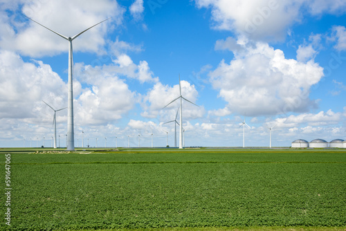 Tal wind turbines in a wind park in the countryside on a sunny summer day