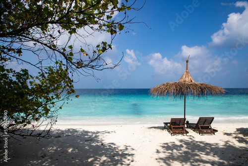 beach chairs on beautiful tropical beach © Melinda Nagy
