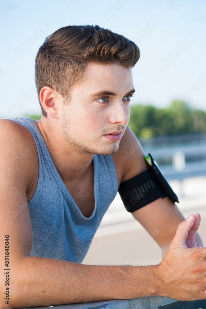 Portrait of Young Man wearing Pedometer, Worms, Rhineland-Palatinate, Germany