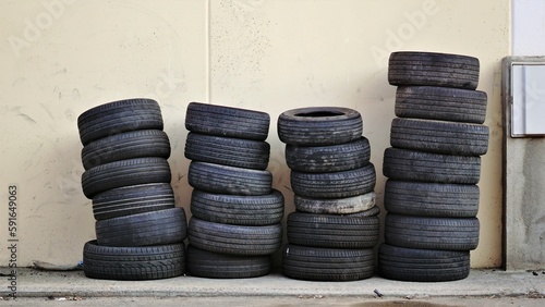 tires stacked on industrial warehouse wall