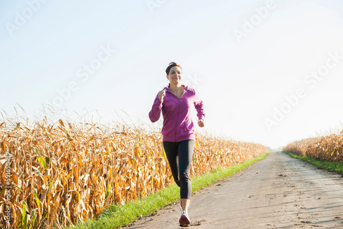 Mature Woman Jogging Outdoors, Baden-Wurttemberg, Germany photo