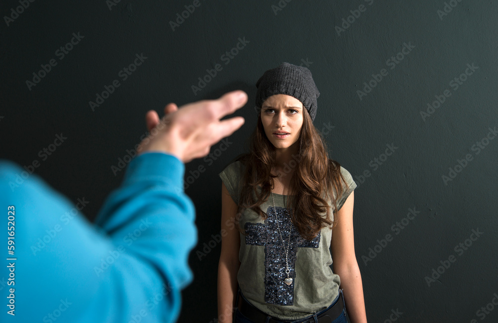 Teenage Girl and Young Man Arguing, Studio Shot Teenage Girl and Young Man Arguing, Studio Shot