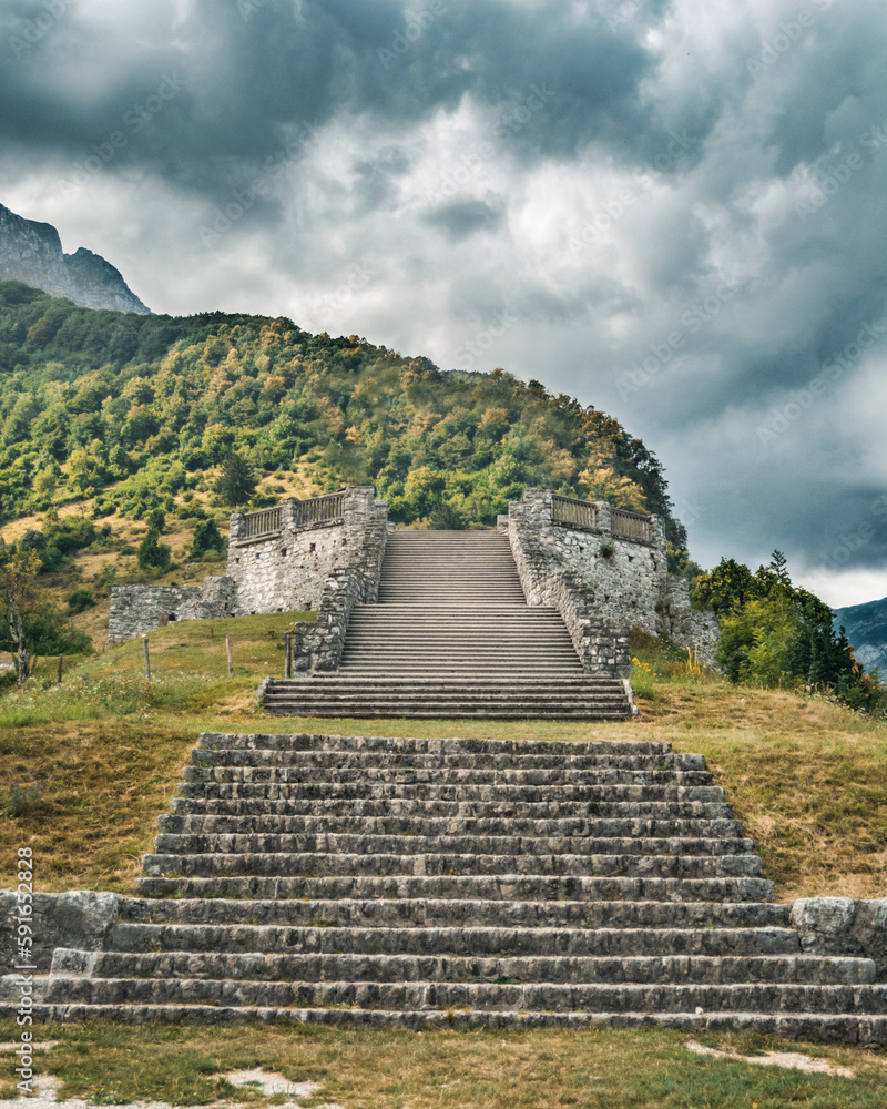 Lonely stairs in the middle of a forest. Couldy day. Stones, old scenario. Slovenian landscape Lonely stairs in the middle of a forest. Couldy day. Stones, old scenario. Slovenian landscape