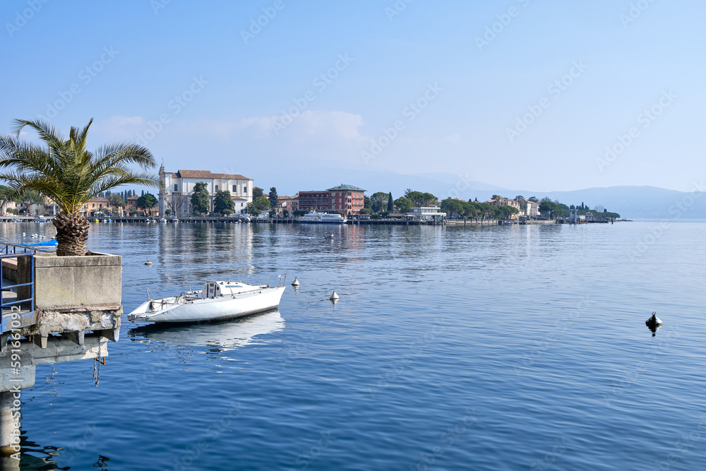 Gardone Riviera, Italy: View of Gardone Riviera at the lakeside of Lake Garda in spring in a sunny day