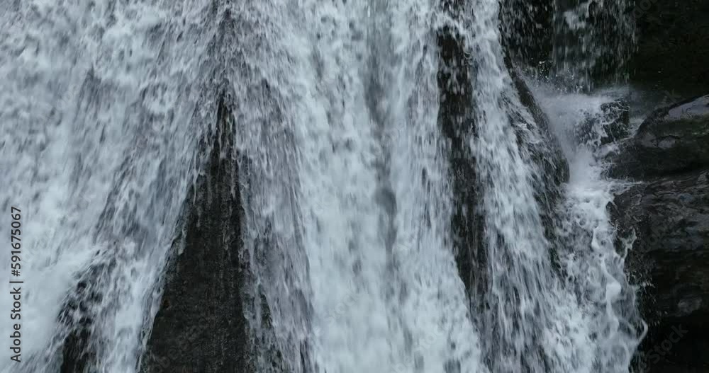 Slow motion close up of a waterfall Slow motion close up of a waterfall