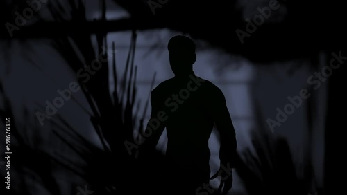 Man hidden in the shadows exterior night