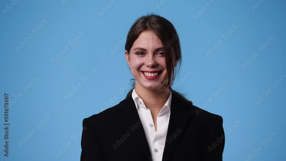 4k video of one woman with positive emotions over blue background. 4k video of one woman with positive emotions over blue background.