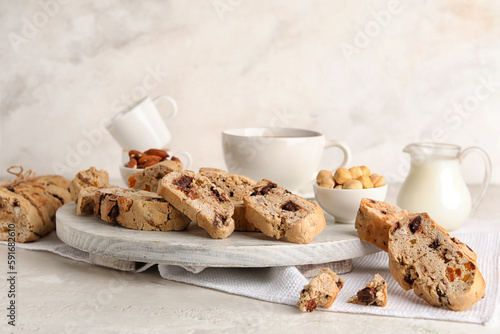 Wooden board with tasty bis...