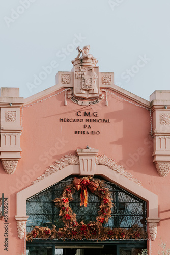 Oporto, Portugal. April 12 , 2022: facade of Mercado Beira-Rio and blue sky photo