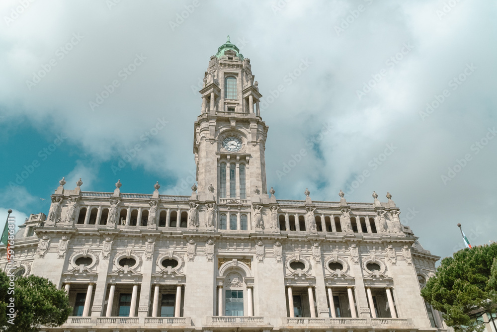 Oporto, Portugal. April 12 , 2022: Porto City Hall building with its architecture and blue sky.