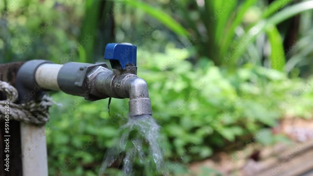 video of an outdoor water faucet that is being opened video of an outdoor water faucet that is being opened