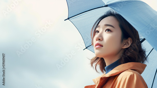 梅雨の時期に雨の日に傘をさす女性（6月・Generative AI）
 photo