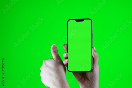 Thumbs up sign hand gesture on green screen. Simbol of approval like positive emotion. Closeup. High quality photo