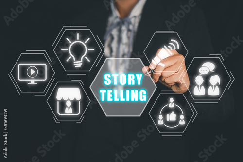 Photos Story telling concept, Business person hand touching story telling icon on virtual screen