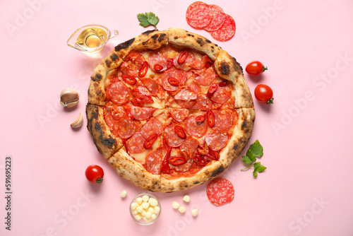 Delicious pepperoni pizza and ingredients on pink background
