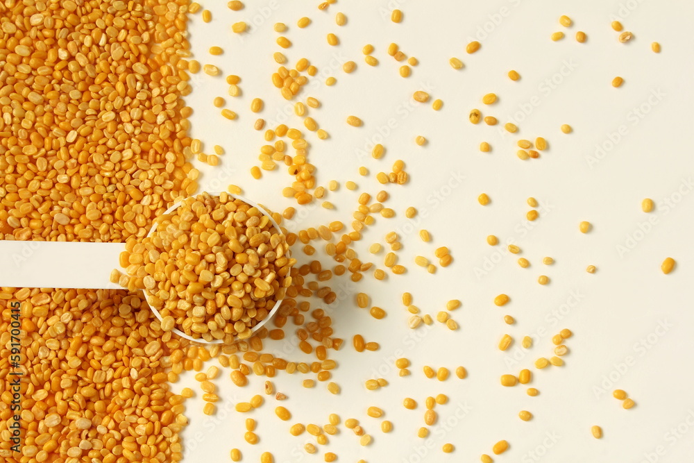 yellow split mung dal, moong dal beans for indian or gujarati food recipe on white background