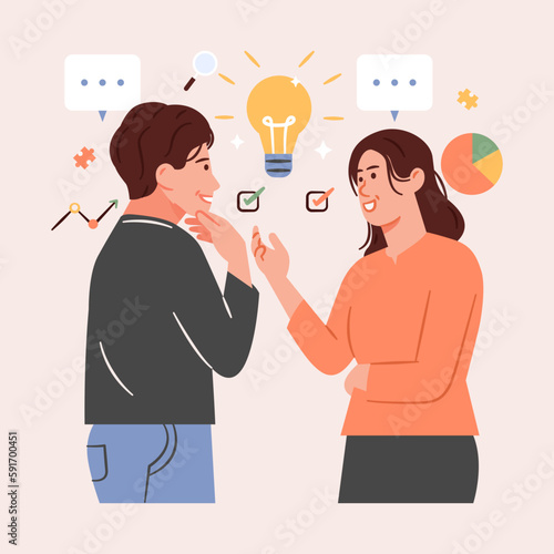 Working together, a businessman and a woman exchange ideas in a speech bubble with a lightbulb concept. Communication that works to generate ideas for solutions or outcomes.