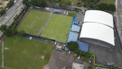 Dato' Suleiman Mohd Noor Indoor Sports Facility Looking Down on the Soccer Fields and Building from Above with an Aerial Drone in Malaysia. photo