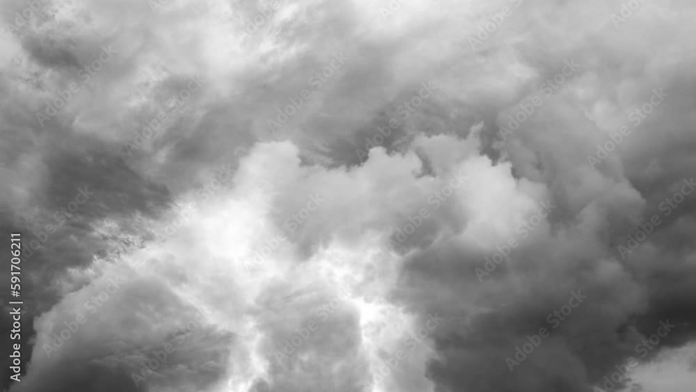 a storm in the dark sky and a bolt of lightning. a storm in the dark sky and a bolt of lightning.