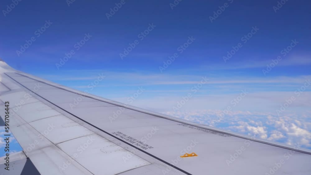 Slow motion scenery of wing flying through air Slow motion scenery of wing flying through air