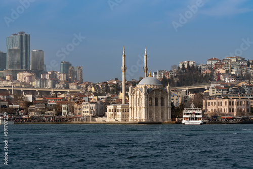 Ortakoy Mosque (Buyuk Medjidie Kamii) in Besiktas district on the embankment of the Ortakoy Pier Square from the waters of the Bosphorus, Istanbul, Turkey