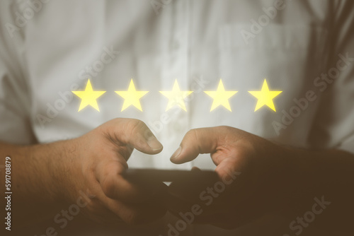 User give rating to service experience on online application and give five star symbol to increase rating of product and service concept, give satisfaction in service. Rating very impressed.