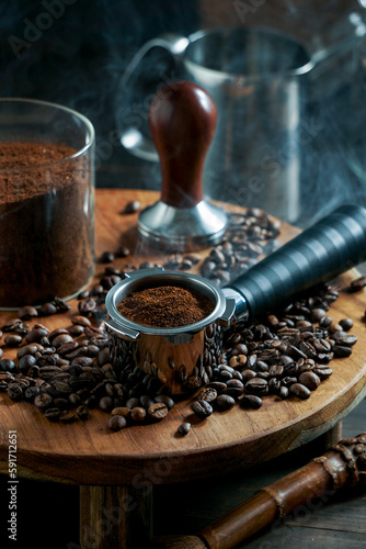 tamper coffee and coffee presser, dark backgrounds photo