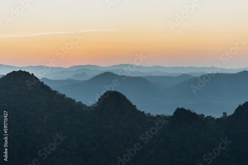 Beautiful scenery, natural landscape, morning light and mist in the valley on the high mountain of Thailand.