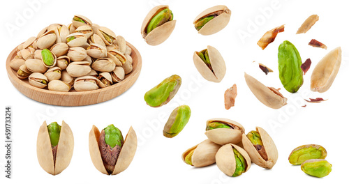 a set of unbleached pistachio nuts isolated on white background. photo