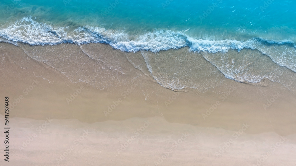Aerial view with beach in wave of turquoise sea water shot, Top view of beautiful white sand background Aerial view with beach in wave of turquoise sea water shot, Top view of beautiful white sand background