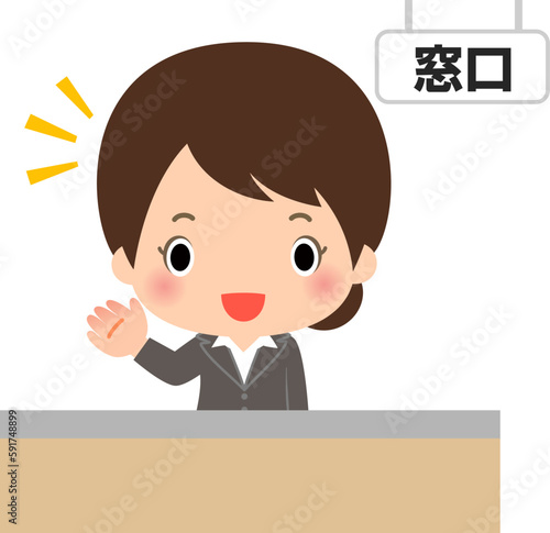 窓口で応対する笑顔の女性職員