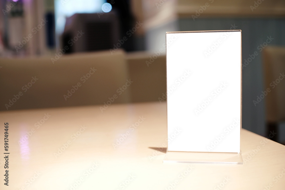 Menu frame standing on wood table in Bar restaurant cafe. space for text marketing promotion. Menu frame standing on wood table in Bar restaurant cafe. space for text marketing promotion.